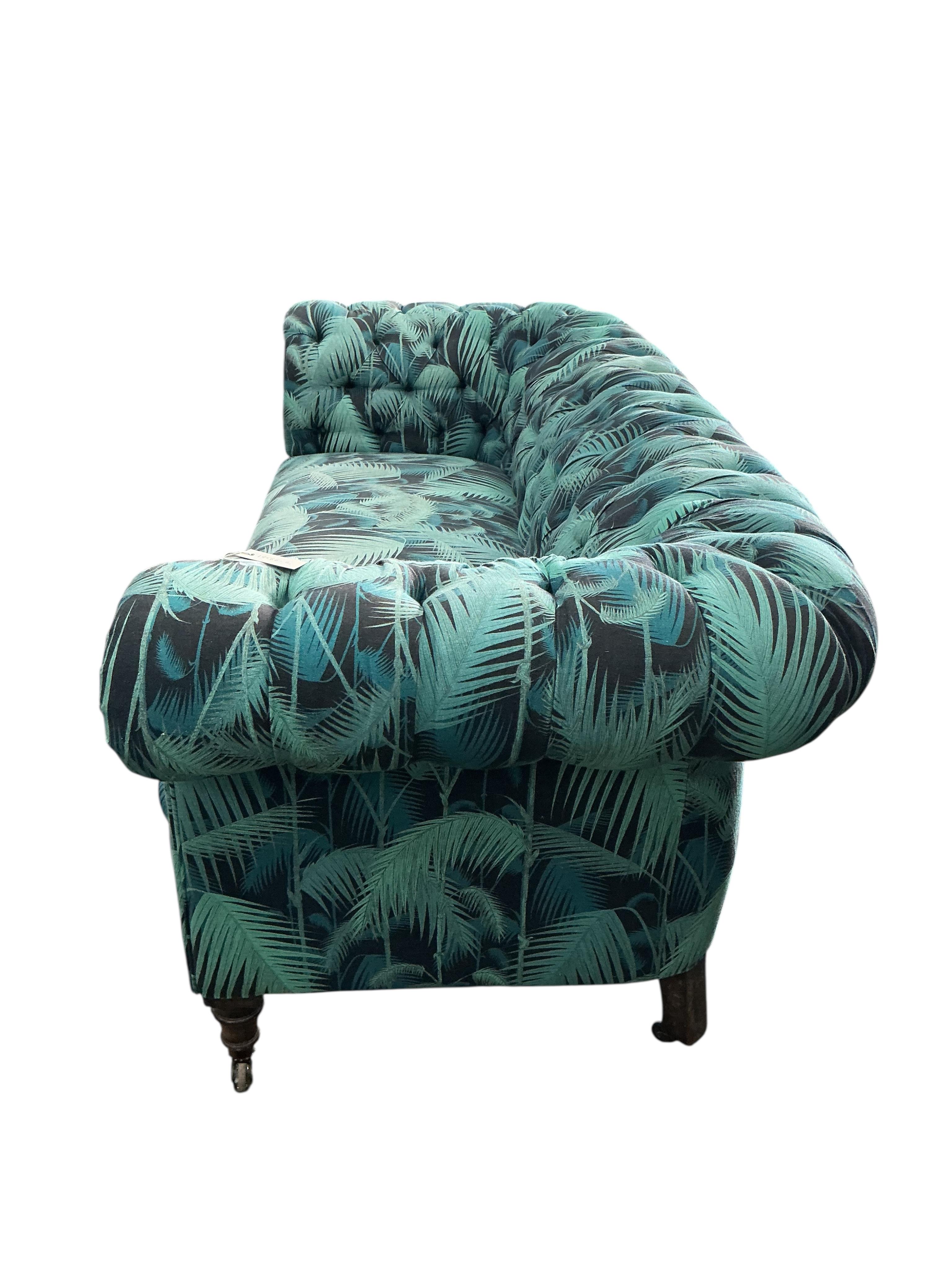 A late Victorian upholstered Chesterfield settee, width 190cm, depth 80cm, height 75cm